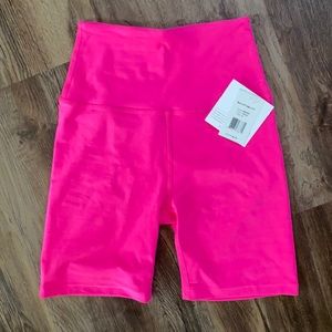 NWT never worn pink glo biker shorts size S